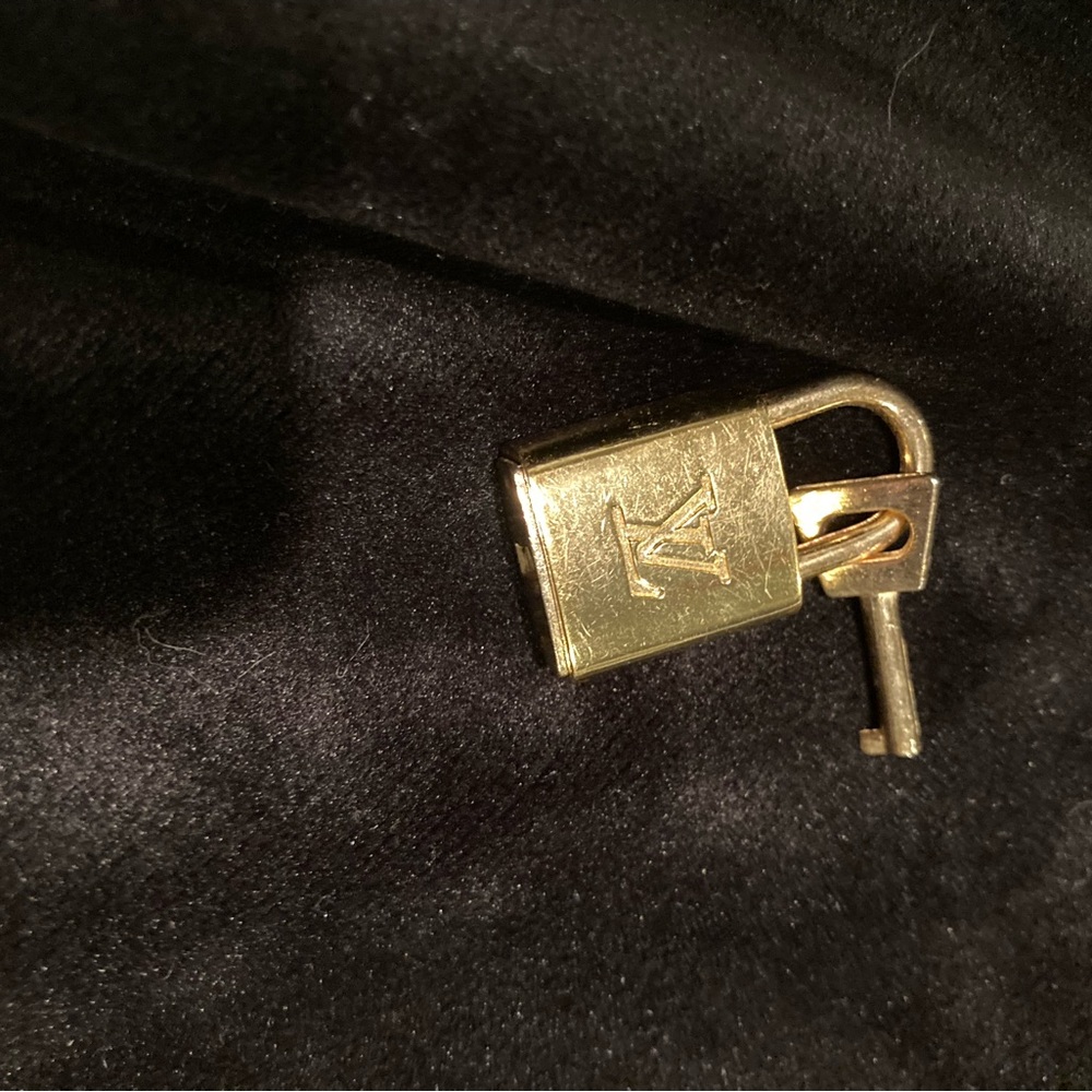 - Authentic Louis Vuitton lock and key